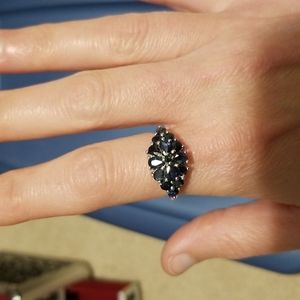 Sterling silver ring with blue stones